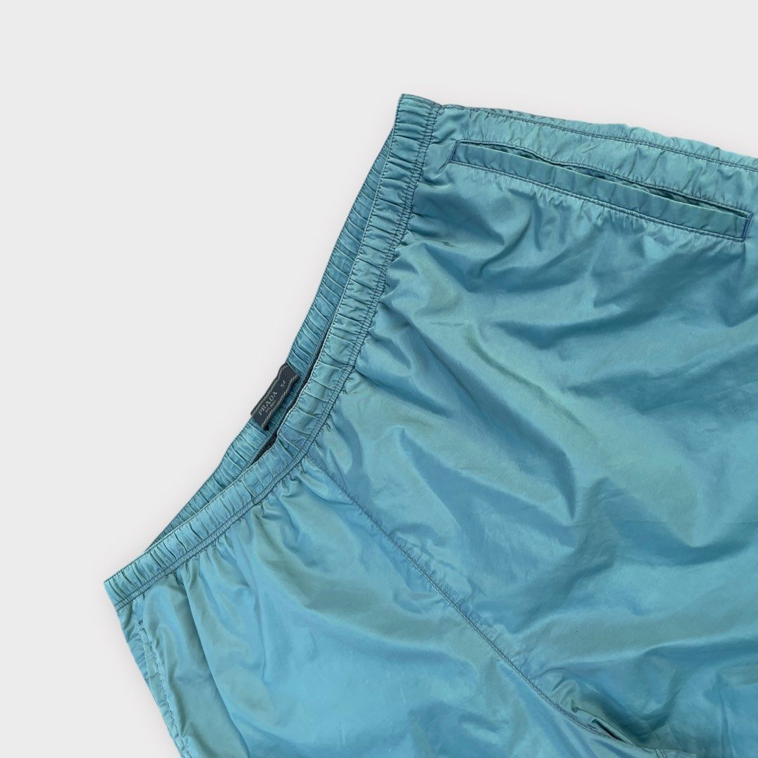 Prada - Vintage Teal Swimming Shorts (Category: Shorts) located in Los Banos. Submitted by declutterking (Listing ID 1460489470, Image 2). Description: Size 54 on tag Dimensions: 17" waist 11" front rise 17.25" length 12.25" leg opening Excellent condition Authentic.