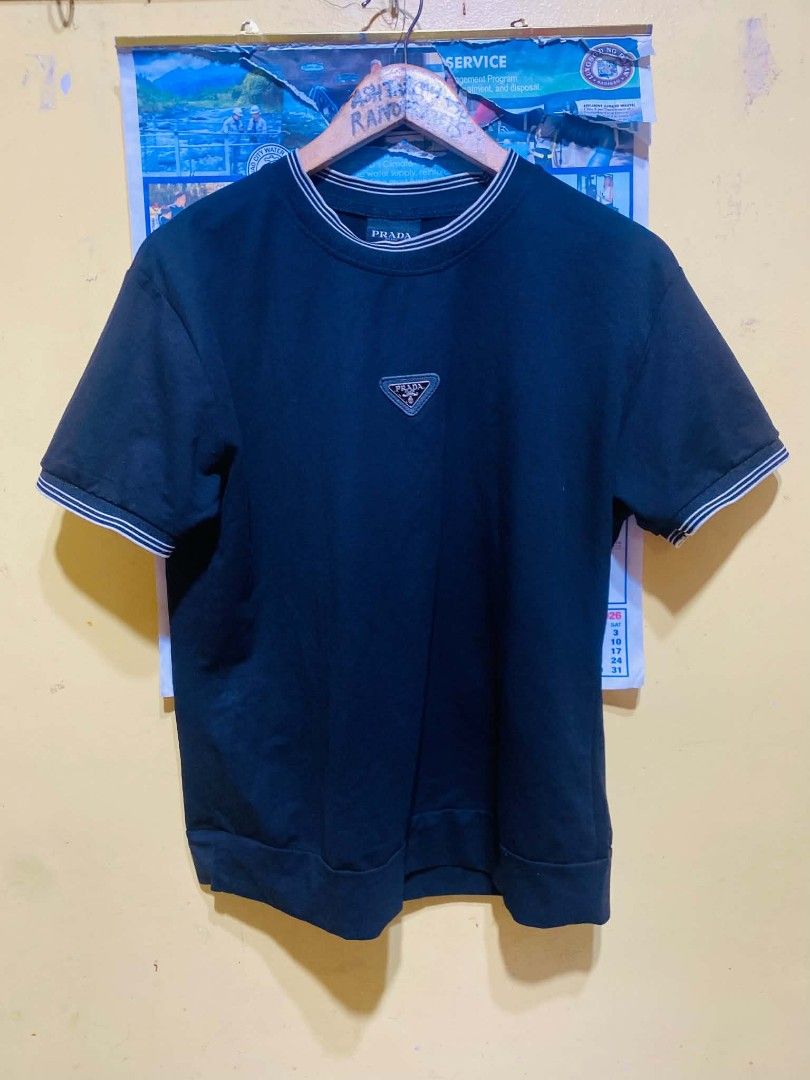 Prada Cotton T-Shirt (Category: Shirts) located in San Isidro, Davao Oriental. Submitted by ranofrehets (Listing ID 1460476623, Image 1). Description: Prada Cotton T-Shirt P450 plus sf No Issues No Stain Goods pa Medium to Large frame Black sa actual.