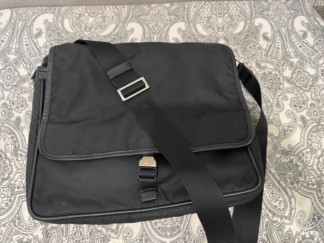 Prada crossed body bag (Category: Luxury Bags & Wallets) located in Muntinlupa City. Submitted by skapdesign (Listing ID 1460351310, Image 1). Description: -pre loved -clean in & out -unisex -can fit 13” laptop -cam fit a4 docs .