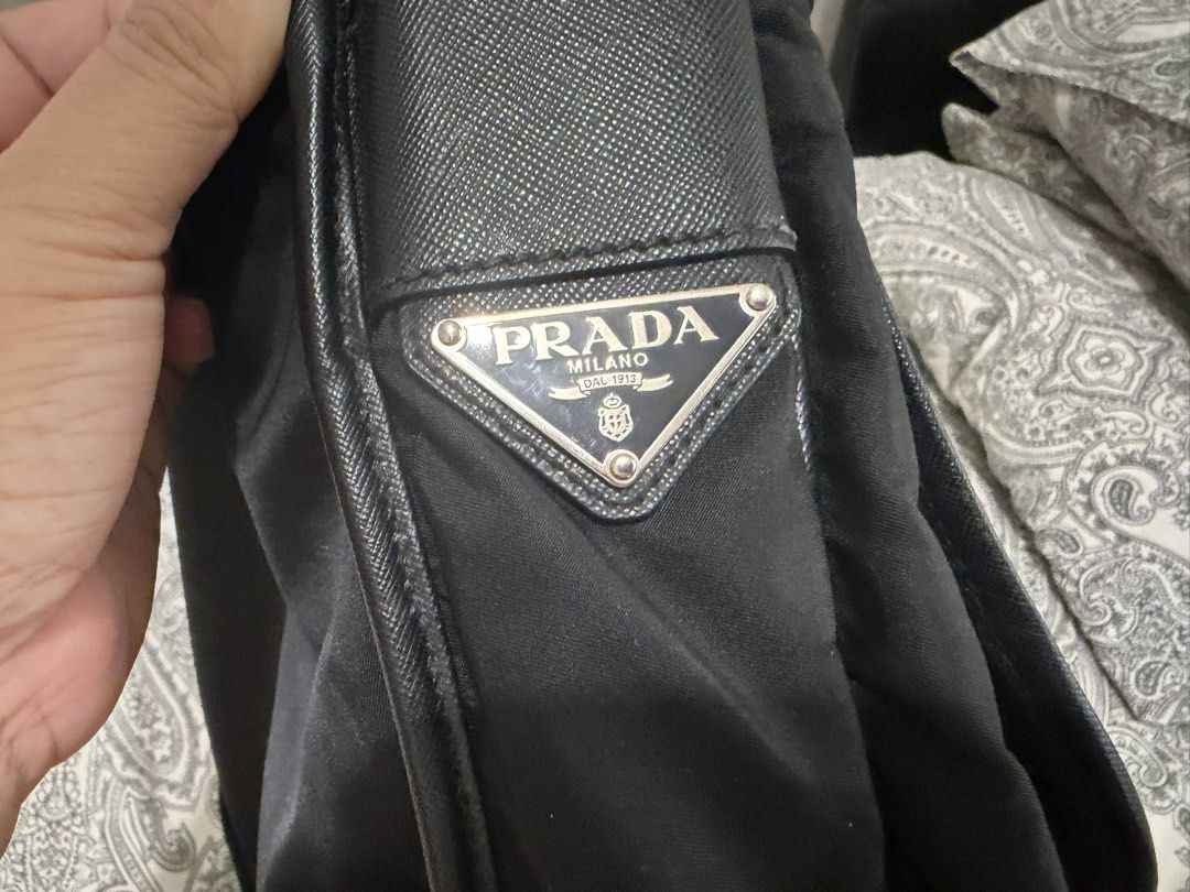 Prada crossed body bag (Category: Luxury Bags & Wallets) located in Muntinlupa City. Submitted by skapdesign (Listing ID 1460351310, Image 3). Description: -pre loved -clean in & out -unisex -can fit 13” laptop -cam fit a4 docs .