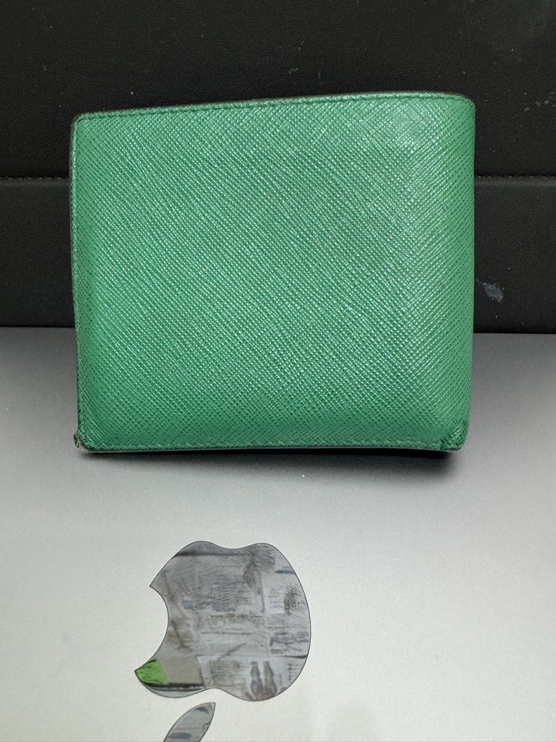 Prada Green Saffiano Leather Bi-fold Wallet (Category: Luxury Bags & Wallets) located in Manila. Submitted by closet.r3set (Listing ID 1460314956, Image 2). Description: Prada Saffiano Leather Wallet Emerald Green Srp is 3100 AED selling for 10k Location: Manila .