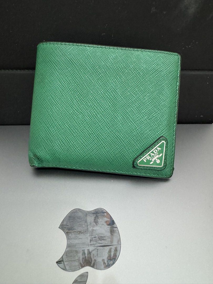 Prada Green Saffiano Leather Bi-fold Wallet (Category: Luxury Bags & Wallets) located in Manila. Submitted by closet.r3set (Listing ID 1460314956, Image 1). Description: Prada Saffiano Leather Wallet Emerald Green Srp is 3100 AED selling for 10k Location: Manila .