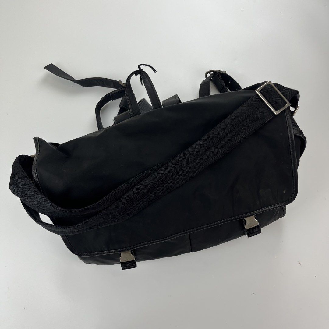 PRADA MESSNGER / BACKPACK ✨ (Category: Luxury Bags & Wallets) located in Iloilo. Submitted by anonymous_ph (Listing ID 1460349309, Image 2). Description: PRADA MESSENGER / BACKPACK BAG✨ DETAILS POSTED! MINIMAL SIGN OF USED ONLY / NO MAJOR FLAW LARGE SIZE ( HEIGHT 11.5 | BODY LENGTH 18) -AUTHENTIC DM IF INTERESTED 📩.