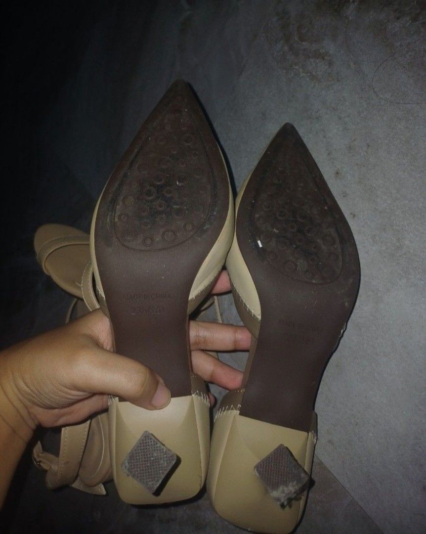 Prelove Beige Heels (Category: Heels) located in Cavite. Submitted by preloved_items_by_erica (Listing ID 1460385606, Image 3). Description: - Beige block heel sandals - Secure ankle strap - Soles show some wear - Small snag on the bottom of one sandal - Plenty of life left for casual wear or events.