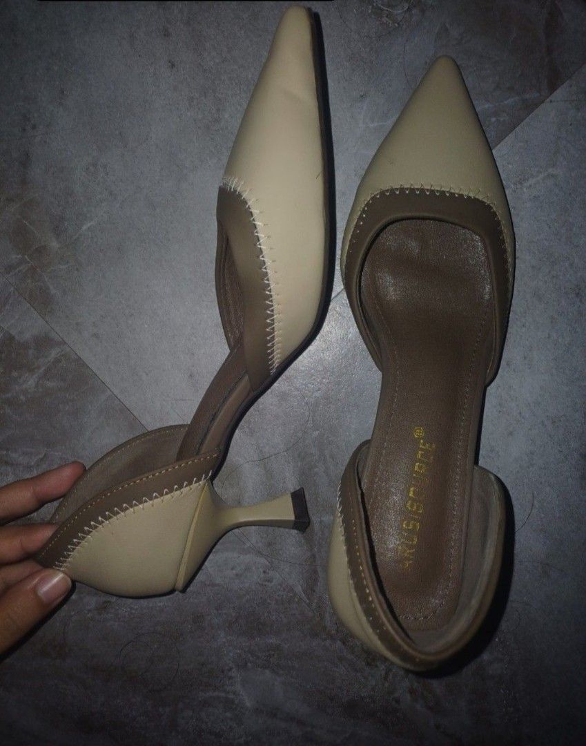 Prelove Beige Heels (Category: Heels) located in Cavite. Submitted by preloved_items_by_erica (Listing ID 1460385606, Image 2). Description: - Beige block heel sandals - Secure ankle strap - Soles show some wear - Small snag on the bottom of one sandal - Plenty of life left for casual wear or events.