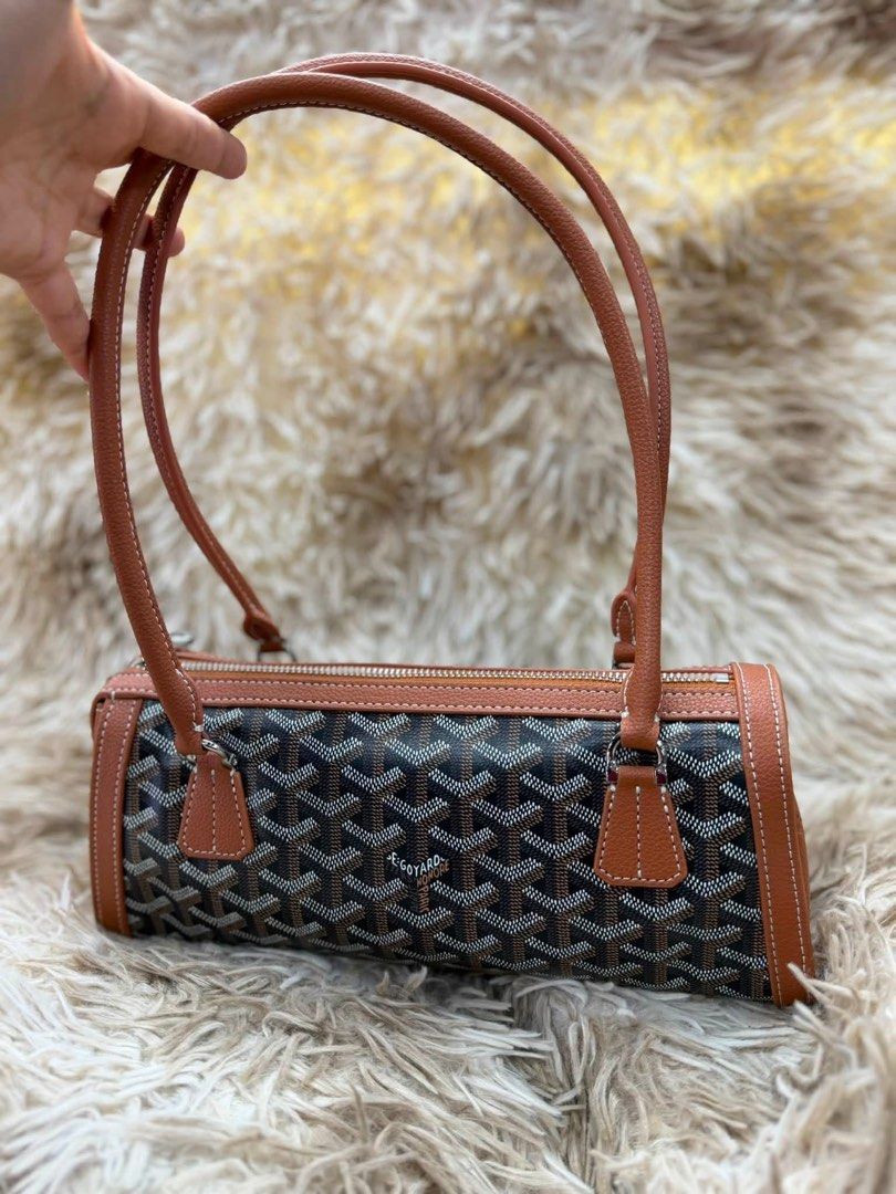 Preloved Bonbonniere Tote Bag (Category: Tote Bags) located in Manila. Submitted by bagsandshoesmanymore (Listing ID 1460427614, Image 1). Description: Preloved Bag Size 30cm Goyardine canvas Zipped closing system with double sliders Actual photo posted.