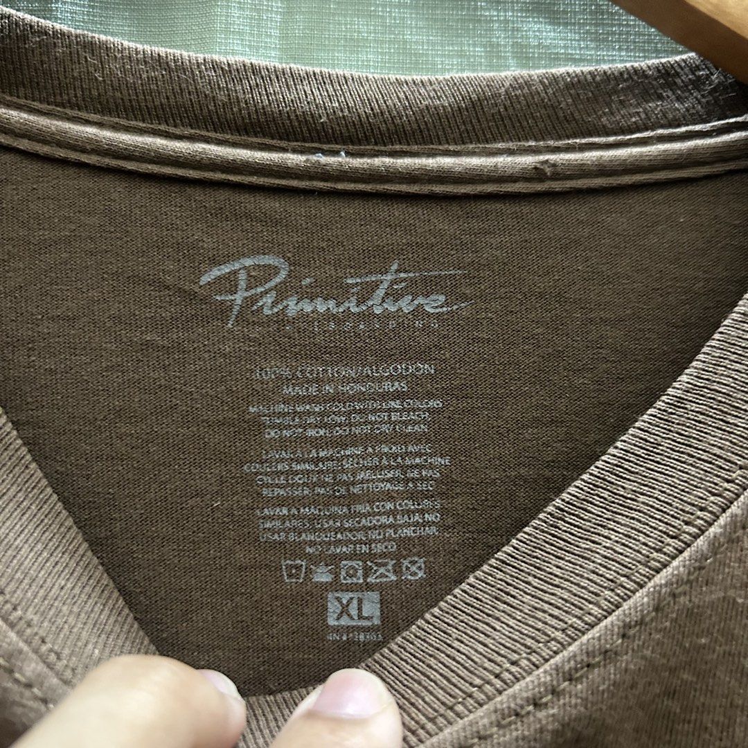 Primitive Triumph (Category: Tshirts & Polo Shirts ) located in Manila. Submitted by offthebins (Listing ID 1460314172, Image 3). Description: 22x29 Minimal hairlines on front, Minimal scratch on neck.