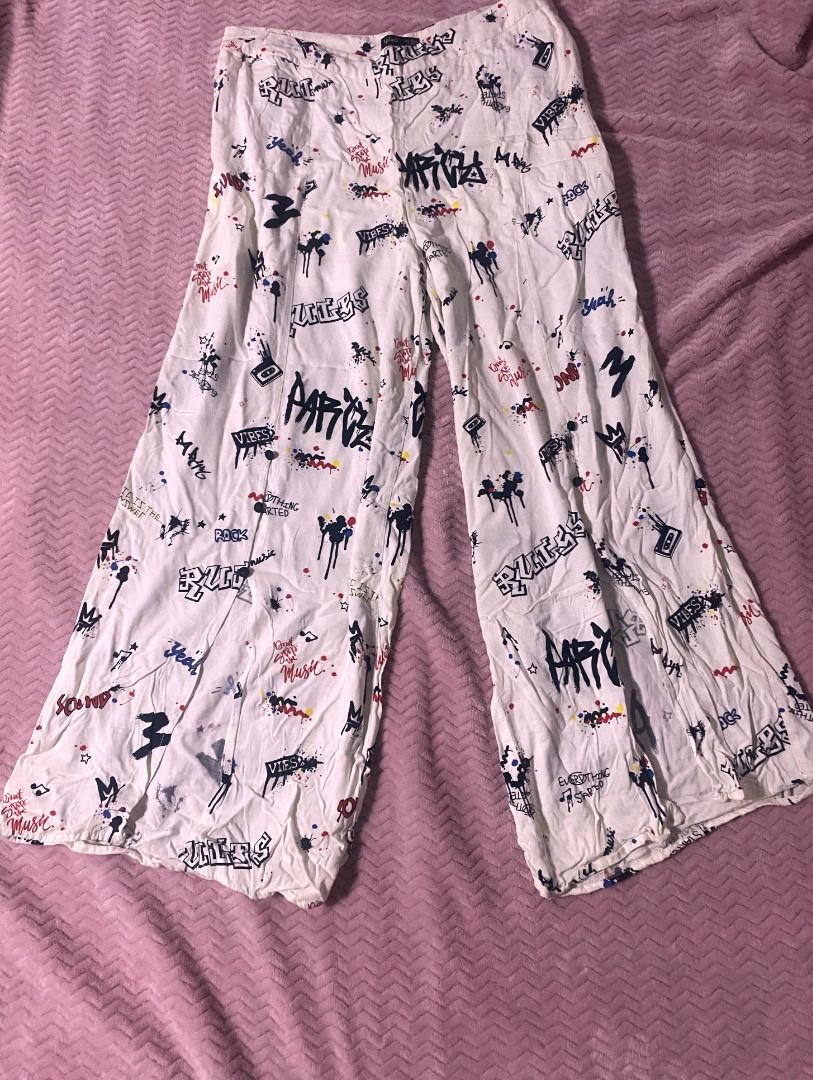 Printed Wide leg pants (Category: Other Bottoms) located in Manila. Submitted by diorellecoeur_xxx02 (Listing ID 1460502896, Image 1). Description: Bought from Qatar. With slit sa baba. Can wear sa beach. Medium to large.
