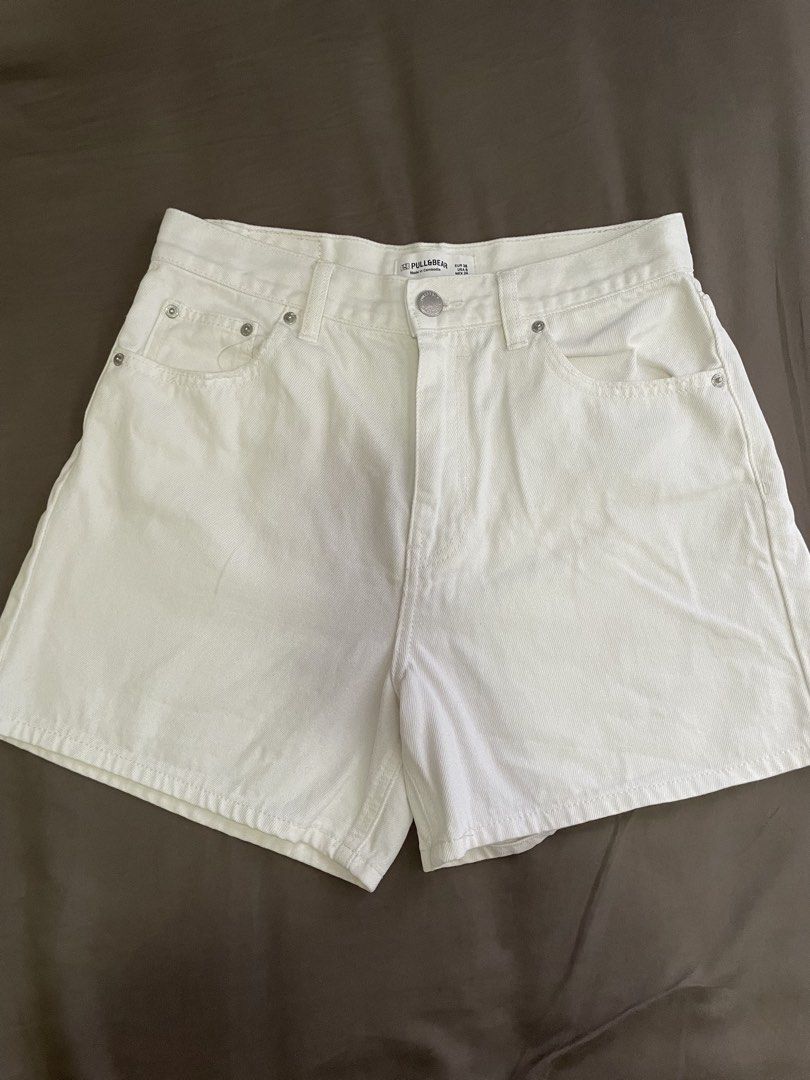 Pull & Bear White Denim Shorts (Category: Shorts) located in Manila. Submitted by lvdybugs (Listing ID 1460312982, Image 1). Description: - Brand: Pull & Bear - Color: White - Style: Classic denim shorts - Closure: Button and zip - Perfect for: Casual wear, versatile pairing with any top - Condition: Good.