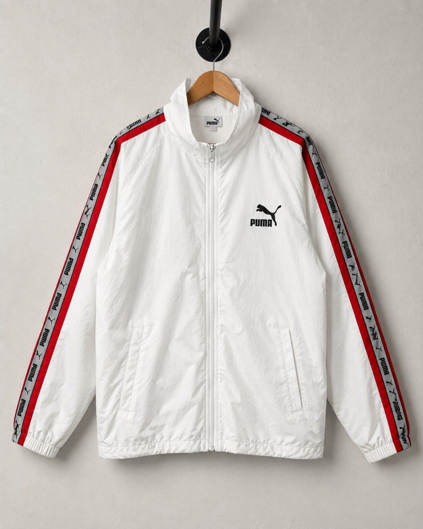 Puma Side Tape Windbreaker (Category: Coats, Jackets and Outerwear) located in Manila. Submitted by xendrift (Listing ID 1460495357, Image 1). Description: W: 24" : L: 28" Size: Large to XL Color rate: 10/10 condition: Excellent no issue Thrifted item, ready to wear, Still Negotiable prize, manage your expectation, pm for more photo and info's.