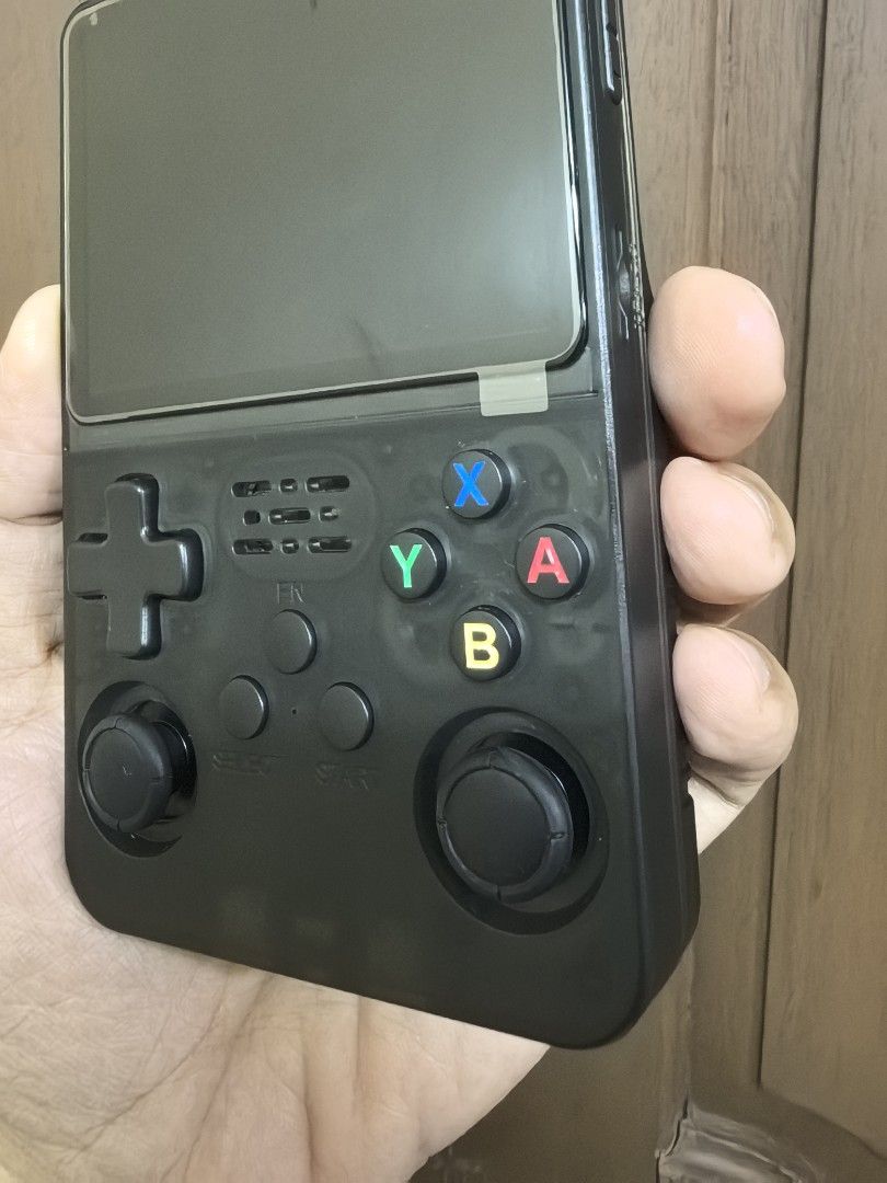 R36S Retro game console 15k games (BLACK) (Category: Others) located in Quezon City. Submitted by unboxingtito (Listing ID 1460414627, Image 3). Description: R36S Retro game console -Brand new and unused -64gb -15k games installed. Gagamitin na lang -comes with box and charging cable -also available in White and Purple color. .