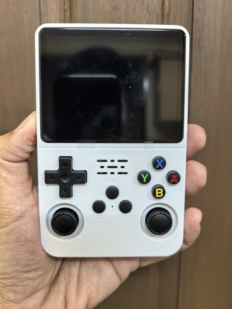 R36S Retro game console 15k games (WHITE) (Category: Others) located in Quezon City. Submitted by unboxingtito (Listing ID 1460415258, Image 1). Description: R36S Retro game console -Brand new and unused -64gb -15k games installed. Gagamitin na lang -comes with box and charging cable -also available in Black and Purple color. .