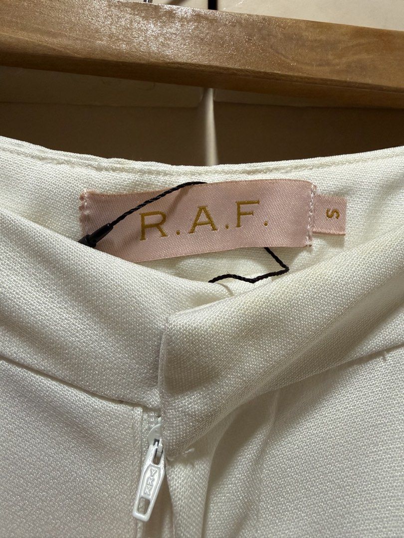 R.A.F. Offwhite Shorts Size S (Category: Shorts) located in Caloocan City. Submitted by oceans18 (Listing ID 1460459828, Image 2). Description: - Off-white R.A.F. shorts - Size: S - Style: Wide leg with cuffed hem - Closure: Zip fly and button - Condition: Brand new with original tag attached - Original Retail Price: PHP 1,598.00.