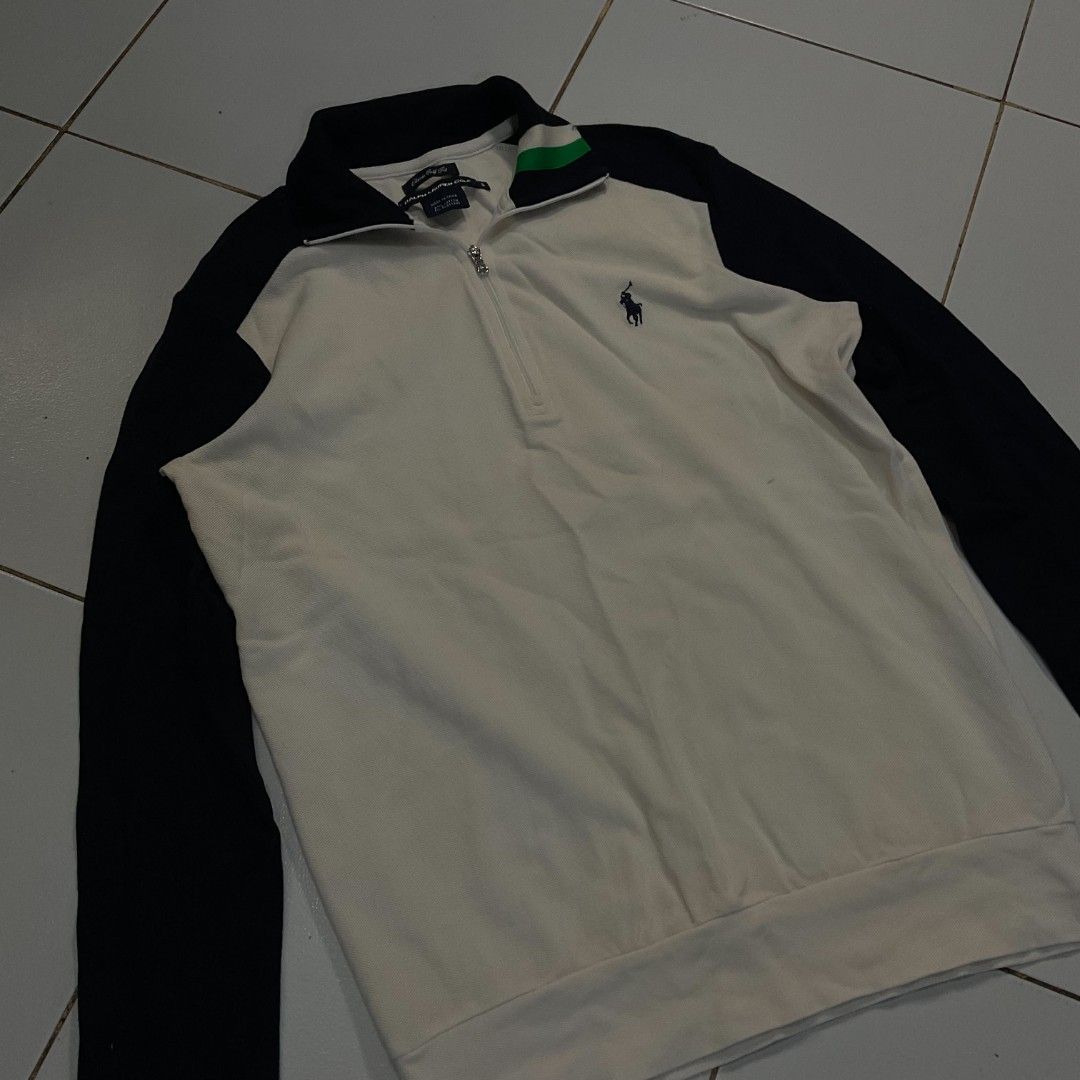 Ralph Lauren Half Zip Sweatshirt Cream Navy (Category: Coats, Jackets and Outerwear) located in Morong. Submitted by rusty.vault (Listing ID 1460412370, Image 2). Description: - Cream and navy Ralph Lauren sweatshirt - Half zip neckline with a collar - Classic polo player logo embroidered on the chest - Ribbed cuffs and hem for a comfortable fit - Ideal for casual wear and layering.