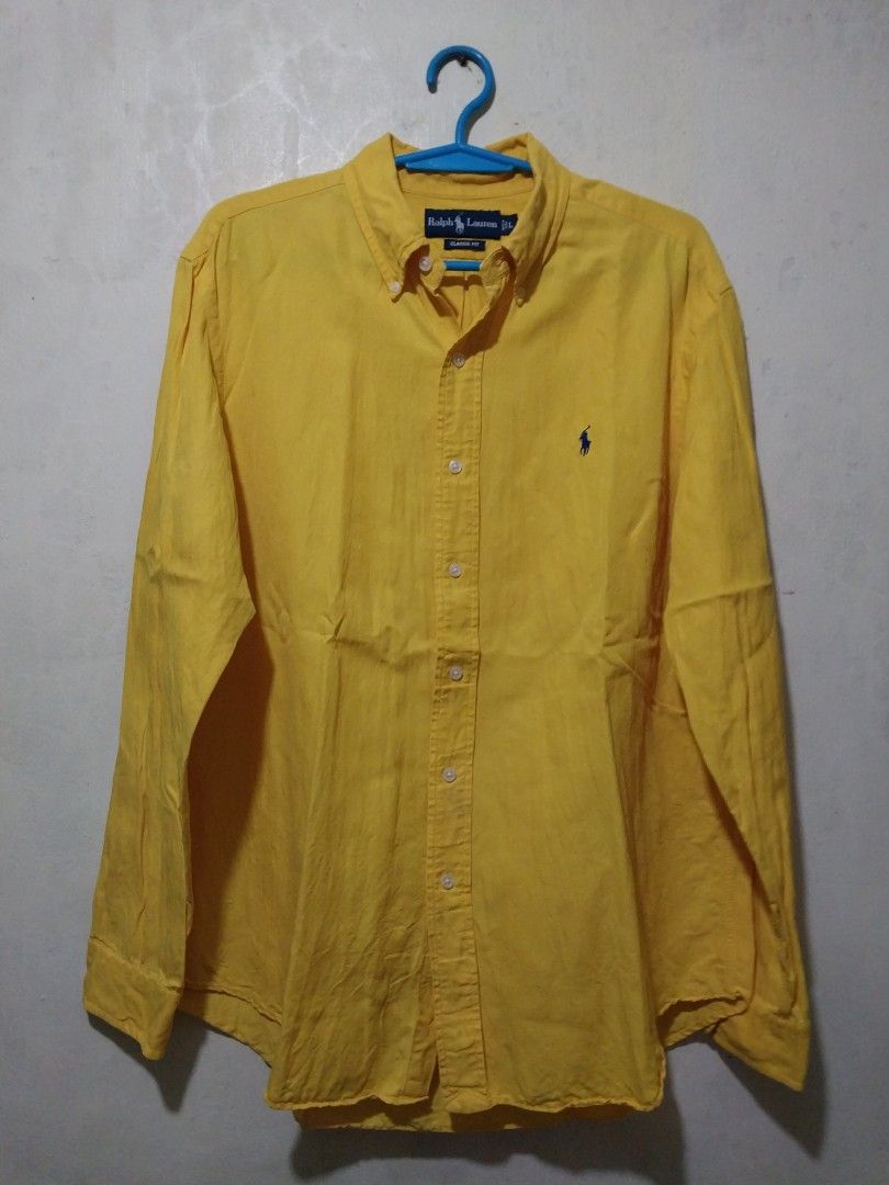 Ralph Lauren Yellow Long Sleeve Shirt (Category: Tshirts & Polo Shirts ) located in Manila. Submitted by PrinceDani.Clothing (Listing ID 1460440607, Image 2). Description: Ralph Lauren yellow longsleeves large on tag 26in width 30-32in length issue: stains/ 1 hole below pony .