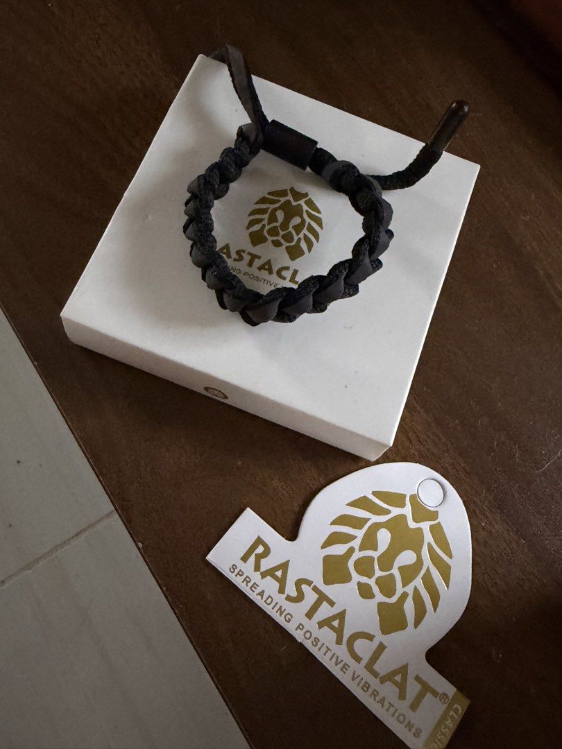 Rastaclat Bracelet Black Purple (Category: Bracelets) located in Manila. Submitted by carlaleyyydonato (Listing ID 1460400602, Image 1). Description: - Rastaclat bracelet - Color: Black with purple accents - Design: Braided - Features: Adjustable strap with clasp closure - Includes: Original box and tag - Style: Great accessory for any outfit.