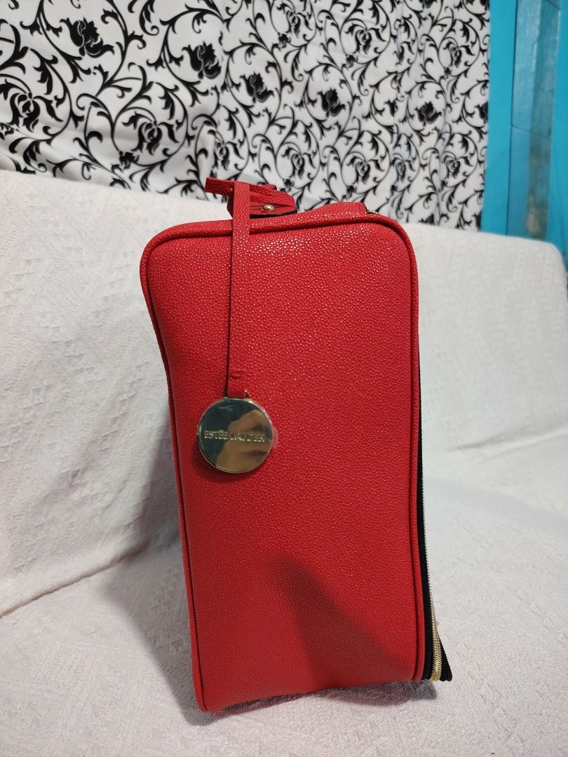 Red Cosmetic Bag with Black Trim (Category: Luxury Bags & Wallets) located in Manila. Submitted by theshopandsmile (Listing ID 1460448513, Image 2). Description: - Vibrant red cosmetic bag with stylish black trim. - Secure zippered closure to keep your items safe. - Spacious interior, perfect for all your makeup and toiletries. - Easy-to-clean lining for hassle-free maintenance. - Ideal for organizing your essentials on the go..
