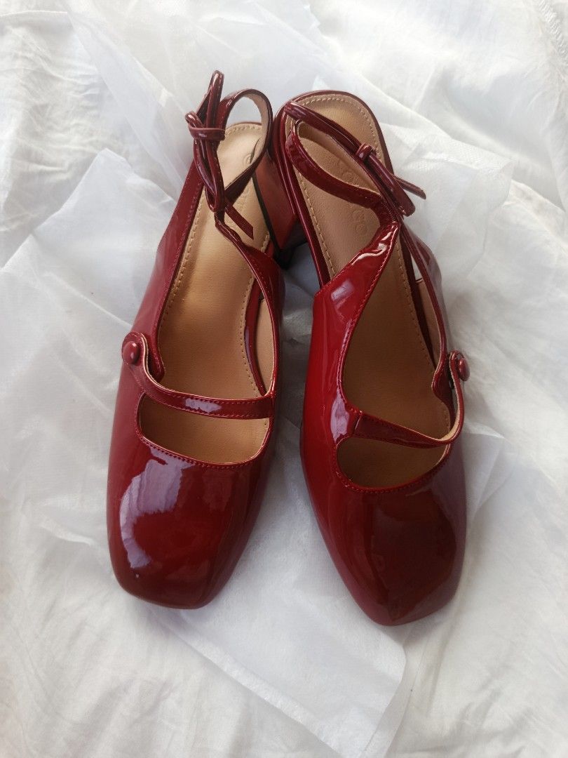 Red Patent Slingback Block Heels (Category: Heels) located in Quezon City. Submitted by shlyyncl_ (Listing ID 1460339215, Image 2). Description: - Eye-catching shiny red slingback heels - Trendy square toe design - Comfortable chunky block heel - Secure strap across the foot with a button detail - Elegant slingback strap with a tie closure at the back.