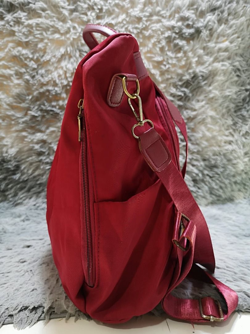 Red Top Handle Backpack With Detachable Strap (Category: Backpacks) located in Santa Cruz. Submitted by jmy_surplus.2 (Listing ID 1460452172, Image 2). Description: Size ; L - 13.5 W - 13 Color ; Red Type ; Backpack bag Brand ; No Brand Material ; Nylon Style ; Red Backpack Bag LR 169 JMY 5 Batch #218.