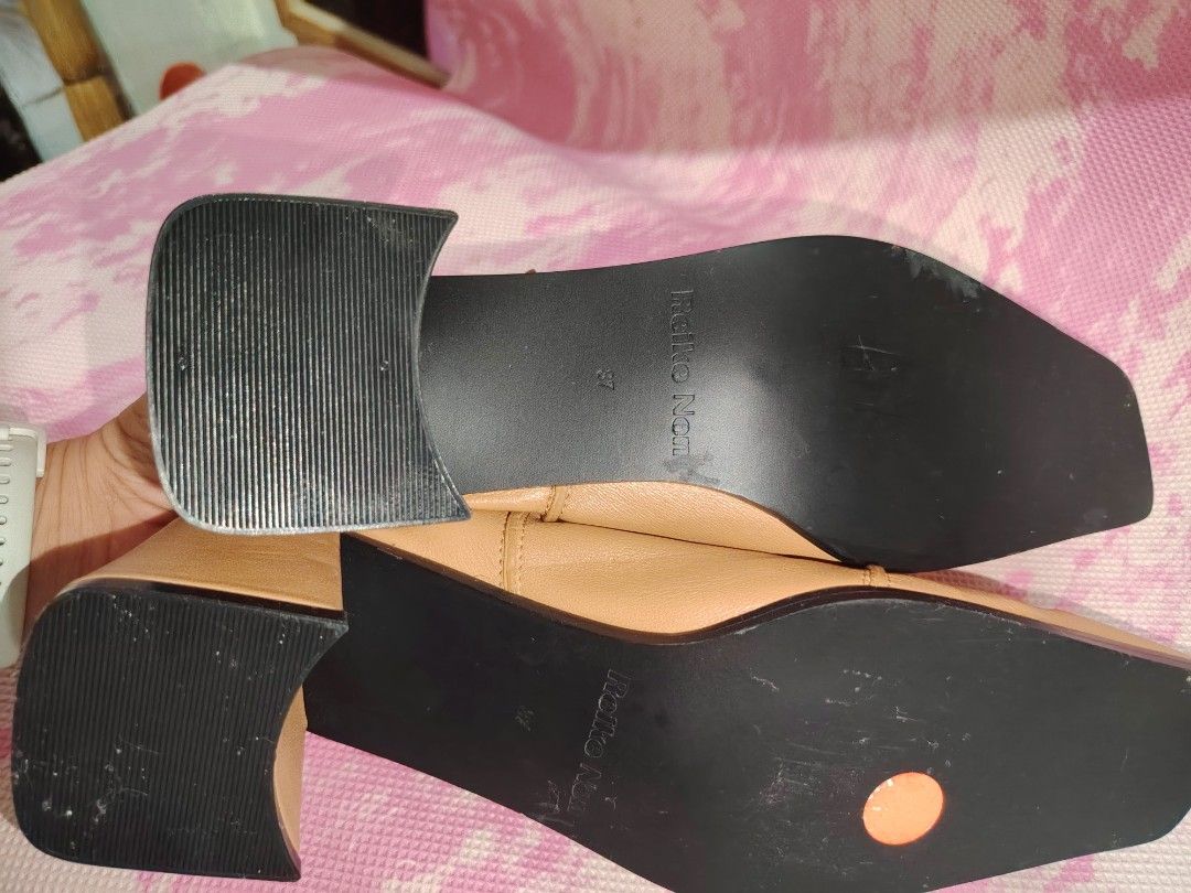 Reike Nen Square Toe Ruched Heels (Category: Heels) located in Cavite. Submitted by kys777 (Listing ID 1460478858, Image 3). Description: - Brand: Reike Nen - Color: Neutral Tan - Design: Square toe with ruched detailing - Heel Type: Comfortable block heel - Condition: Soles show minimal wear - Style: Perfect for dressing up or down.