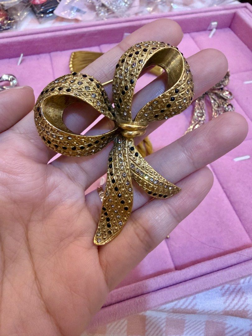 Ribbon Bow Brooches (Category: Brooches) located in Caloocan City. Submitted by fashionshop248 (Listing ID 1460317585, Image 2). Description: Vintage Brooch from Japan ₱350 each 3 gold ribbon ₱100 silver ribbon.