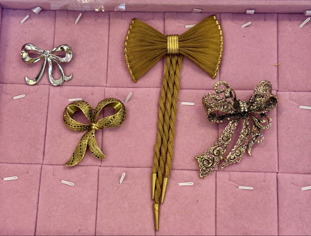 Ribbon Bow Brooches (Category: Brooches) located in Caloocan City. Submitted by fashionshop248 (Listing ID 1460317585, Image 1). Description: Vintage Brooch from Japan ₱350 each 3 gold ribbon ₱100 silver ribbon.