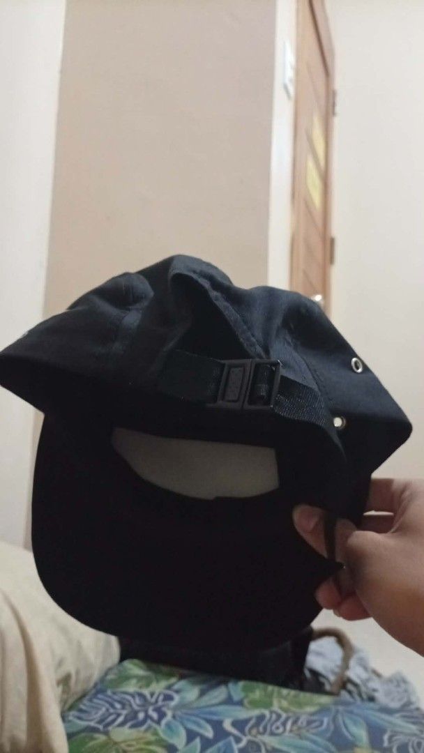 RIPNDIP Black 5 Panel Cap with Cat Graphic (Category: Caps & Hats) located in Manila. Submitted by lilsintenel (Listing ID 1460421529, Image 3). Description: - Brand: RIPNDIP - Style: 5-panel cap - Color: Black - Features: Iconic cat graphic on front, RIPNDIP logo on side - Fit: Adjustable strap at the back - Occasion: Casual wear - Condition: Ready for a new owner.