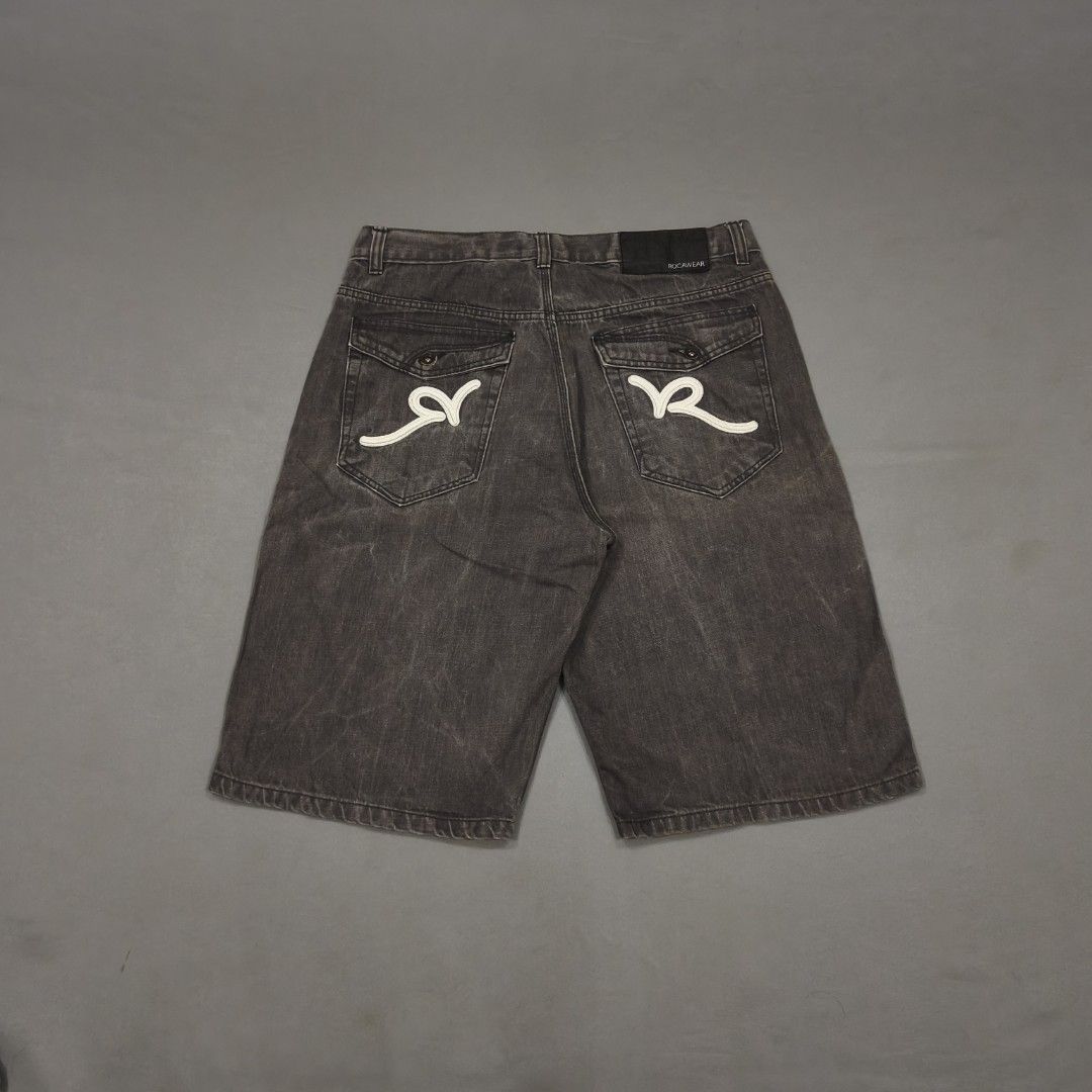 Rocawear Acid Washed Denim Shorts (Category: Shorts) located in Cebu City. Submitted by greedthrift.00 (Listing ID 1460435082, Image 1). Description: - condition: 9.8/10 - color rate: 9.8/10 - Issue: none - waistline: 36" - length: 25" - leg opening: 12" Rocawear grey denim shorts with signature 'R' logo on back pockets. Classic streetwear, perfect for casual wear..