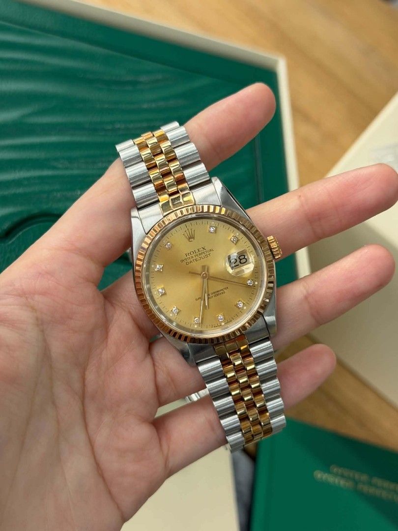 Rolex Datejust Two-Tone Diamond Dial Automatic Watch (Category: Luxury Watches) located in Cainta. Submitted by reycee.18 (Listing ID 1460456125, Image 1). Description: - Rolex Datejust 36 - Two-tone stainless steel and gold - Champagne dial with diamond hour markers -1990 year model 9/10 condition php 425,000 .