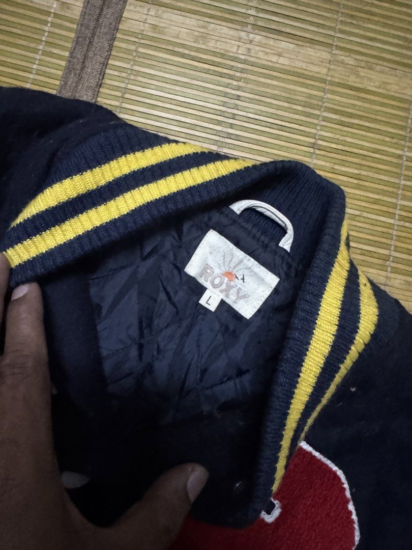 ROXY LETTERMAN JACKET (Category: Coats, Jackets and Outerwear) located in Klang. Submitted by houseofgrailed (Listing ID 1460468539, Image 3). Description: Leather sleeve and finishing ada kesan kuning pd sleeve P19 L23.