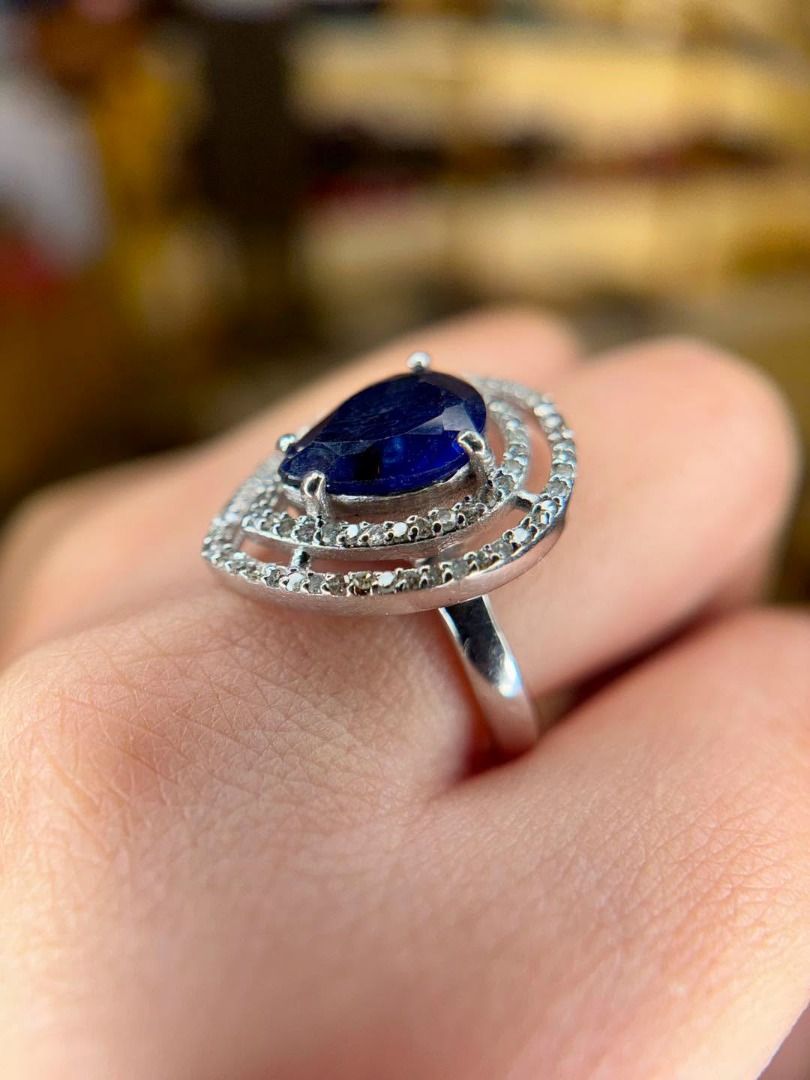 S7.5 NATURAL SAPPHIRE & DIAMOND RING (Category: Rings) located in Baguio. Submitted by asna_taku (Listing ID 1460418493, Image 2). Description: 💙 NATURAL SAPPHIRE & DIAMOND RING A beautiful Natural Blue Sapphire in an elegant pear cut, surrounded by a detailed diamond-accented setting. ✨ 💎 Natural Sapphire — 3.30 cts • Pear/faceted cut • Blue, translucent • East African origin • With numerous round-cut Natural Diamonds, approx. 0.65 ct total • 
