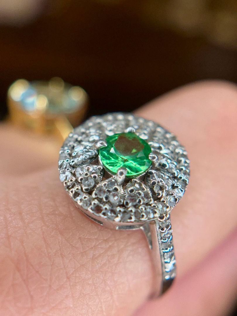 S7 NATURAL TSAVORITE GARNET RING (Category: Rings) located in Baguio. Submitted by asna_taku (Listing ID 1460407427, Image 3). Description: ✨ NATURAL TSAVORITE GARNET — A GREEN BEAUTY! ✨ A petite but seriously captivating Natural Tsavorite Garnet from Tanzania 💚 That vivid, lively green paired with a sparkling diamond halo gives this ring such an elegant, classic look. 💎 Natural Tsavorite Garnet — 0.45 cts 💎 Natural Diamonds — approx. 0.35 ct 