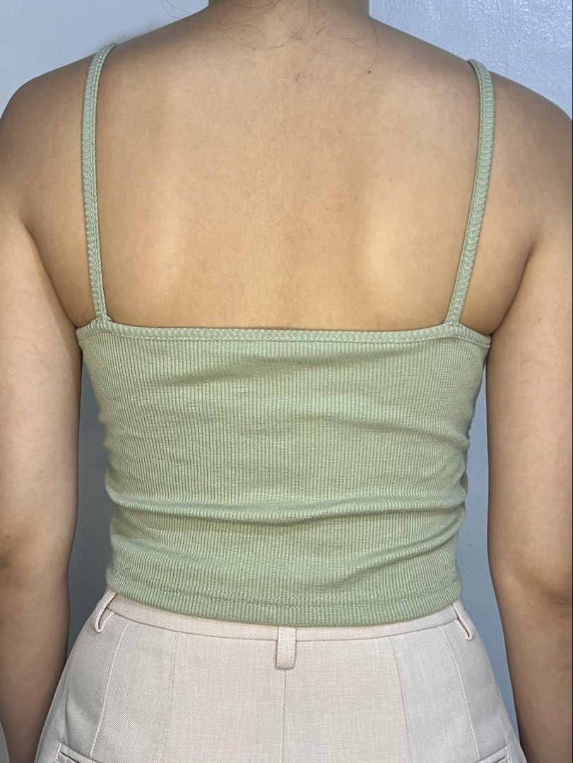 Sage Green Ruched Cami Top (Category: Blouses) located in Marikina City. Submitted by trish.grcia (Listing ID 1460379758, Image 2). Description: • Ribbed & ruched detail • Adjustable side ties • Stretchy fit • Preloved, good condition .