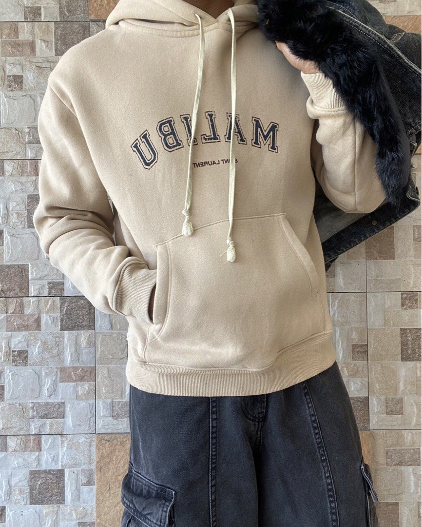 SAINT LAURENT - MALIBU PULL OVER HOODIE (Category: Luxury Accessories) located in Bacolod City. Submitted by timelessarchivesssss (Listing ID 1460469291, Image 1). Description: BEST FOR CASUAL & COZY OUTFITS SIZE: MEDIUM ACTUAL COLOR: BEIGE COLOR RATE: 10 OUT OF 10 CONDITION: GOOD MATERIAL: 100 % COTTON MADE IN :ITALY FLAWS: STAINS ( SEE LAST PHOTO FOR REFERENCE ) DIMENSIONS : LENGTH - 24 WIDTH (ARMPIT TO ARMPIT ) - 22. 5 SHOULDER TO SHOULDER - 2