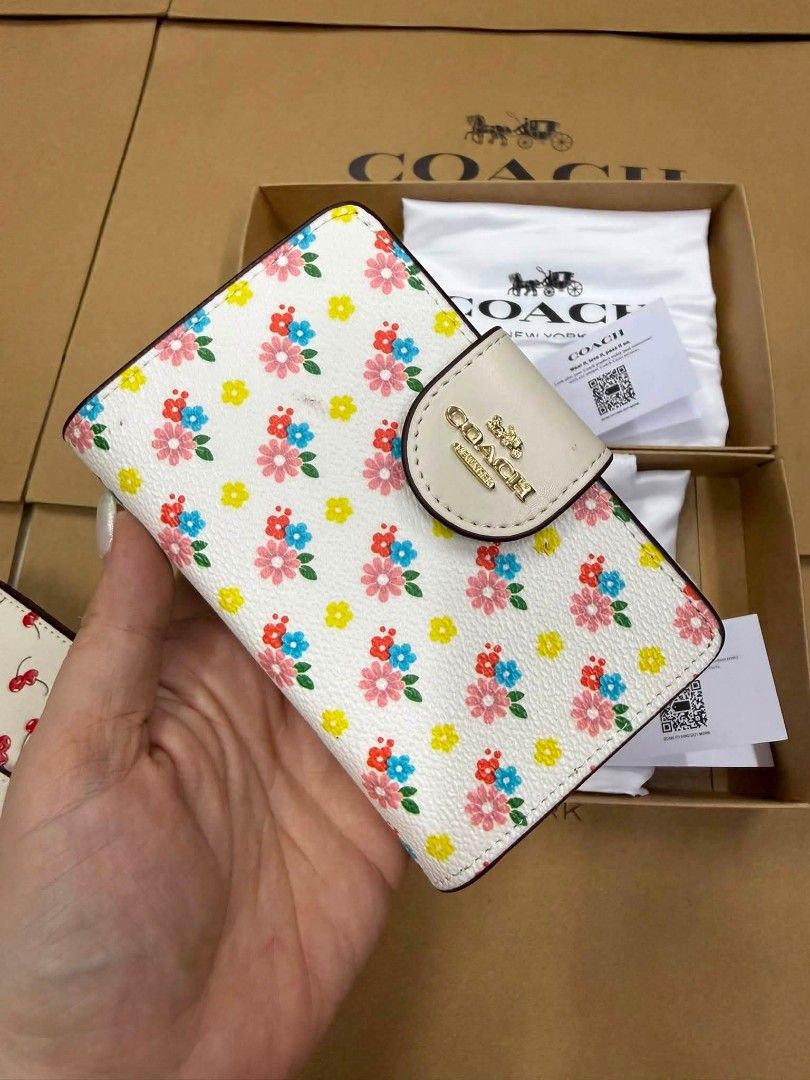 Sale! Coach medium Size Wallet (Category: Wallets & Card holders) located in Mandaluyong City. Submitted by priceles (Listing ID 1460380027, Image 2). Description: Brand New with box and paper bag Good for gifts Discounts available for 2 or more orders NO COD.