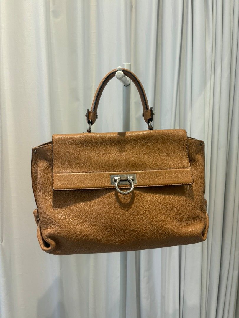 Salvatore Ferragamo Brown Leather Bag (Category: Luxury Bags & Wallets) located in Makati City. Submitted by gensfinds (Listing ID 1460359229, Image 1). Description: .