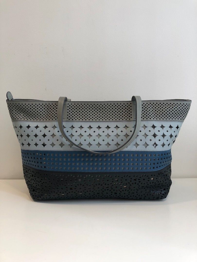 Salvatore Ferragamo Perforated Tote Bag (Category: Luxury Bags & Wallets) located in Makati City. Submitted by gensfinds (Listing ID 1460358785, Image 2). Description: .