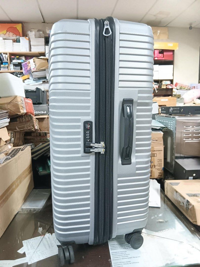 SAMSONITE Medium Size Hardcase Travel Luggage Suitcase (Category: Luggage) located in Pasay City. Submitted by meostore (Listing ID 1460380149, Image 3). Description: -Approx. Meas.: H 28” x L 19” x W 13” (inches) -Brand: Samsonite -Type: Hardshell / Hardcase -Features: 360° rotating wheels; TSA lock; Telescopic handle; Multiple compartments NOTE: Item has a specific broken portion. Please see actual photos. WYSIWYG BASIS!.
