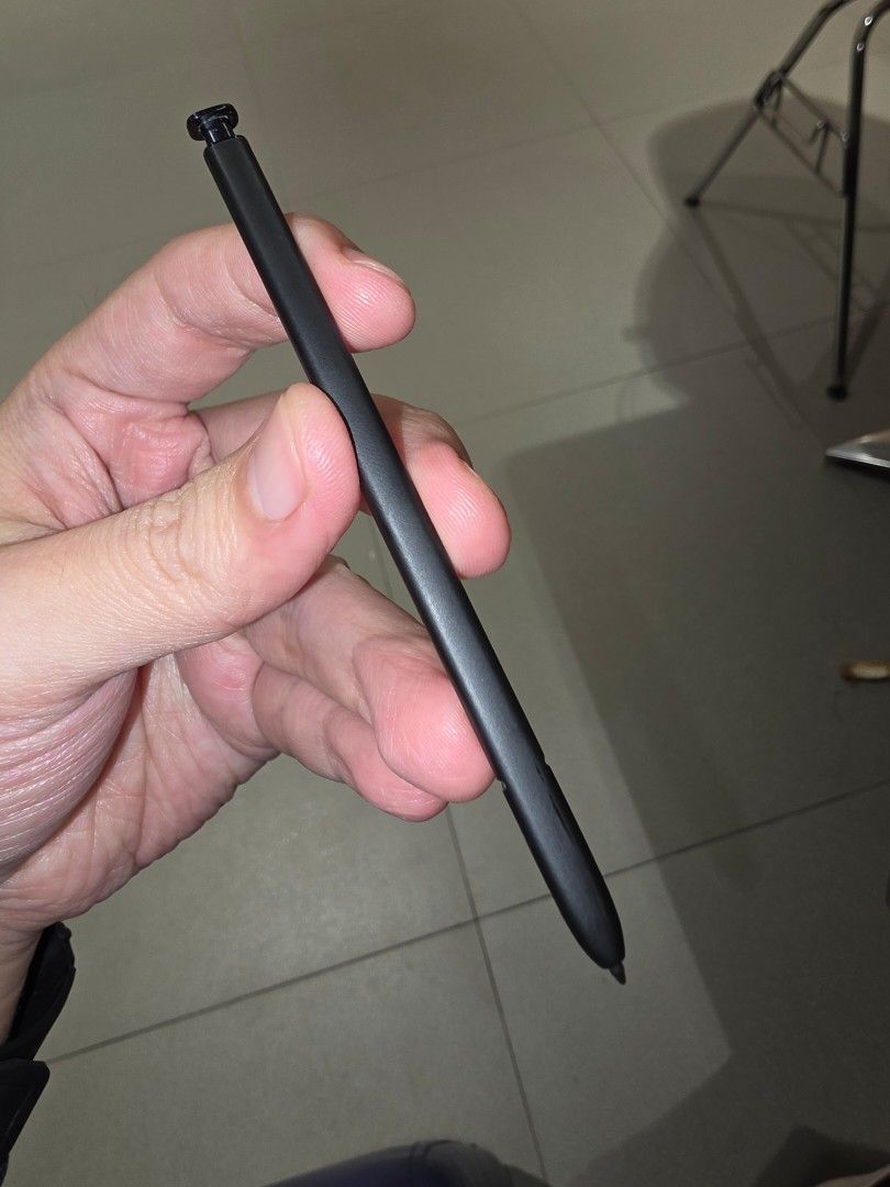 Samsung S23 Ultra S Pen original (graphite) (Category: Other Mobile & Gadget Accessories) located in Taguig. Submitted by mikisayoko (Listing ID 1460499439, Image 1). Description: selling s23 ultra spen, graphite color natrade in na po yung s23ultra kaya natira saken ung spen meetups at uptown mall bgc.
