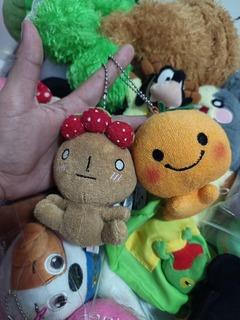 San-X Plush Keychains (Category: Plushies & Soft Toys) located in Daet. Submitted by heracaramel (Listing ID 1460442722, Image 1). Description: - Two adorable San-X plush keychains - Includes an orange character and a brown mushroom with red strawberry accents - Features ball chain attachments for easy hanging - Small size, ideal for decorating bags, backpacks, or purses - A must-have for any San-X enthusiast - Buy both for a cute matching set!.