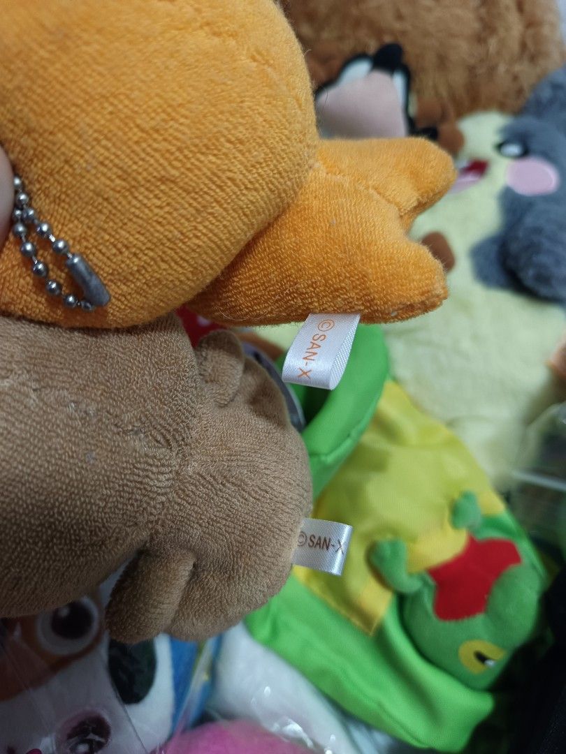 San-X Plush Keychains (Category: Plushies & Soft Toys) located in Daet. Submitted by heracaramel (Listing ID 1460442722, Image 3). Description: - Two adorable San-X plush keychains - Includes an orange character and a brown mushroom with red strawberry accents - Features ball chain attachments for easy hanging - Small size, ideal for decorating bags, backpacks, or purses - A must-have for any San-X enthusiast - Buy both for a cute matching set!.
