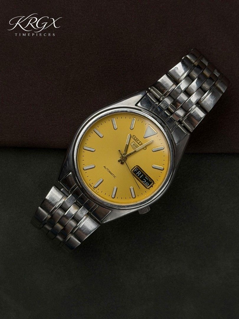 Seiko 5 "Golden Yellow" (Category: Men's Watches) located in Manila. Submitted by kyle_anton11 (Listing ID 1460433179, Image 2). Description: Seiko 5 "Golden Yellow" A classic that doesn’t need to shout to stand out. 💛 ✔️ Movement: 7s26 Automatic ✔️ Case Size: Approx. 37mm ✔️Approx. 7.5 inch wrist size ✔️ All original ✔️ Newly serviced ✔️ Newly polished 📦 Inclusions: Replacement box Payment Options : Bank Transfer, GCash, Maribank, Maya 💰 Pric