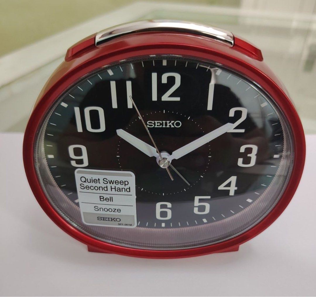 Seiko Clock QHK059R (Category: Clocks) located in Manila. Submitted by seikowatchfactory (Listing ID 1460397228, Image 1). Description: Brand New in Box Authentic Seiko Alarm Clock 10/10 Model: QHK059R Price: 1880 pesos Specifications: Brand: Seiko Diameter: 11.2cm Width: 13cm Depth: 8.1cm Beep alarm with Snooze Case Material: Plastic Black Dial Red Case Acrylic Glass Battery Type: AA x 1 Quiet Sweep Snooze fuction Black Arabic Numerals Seller is