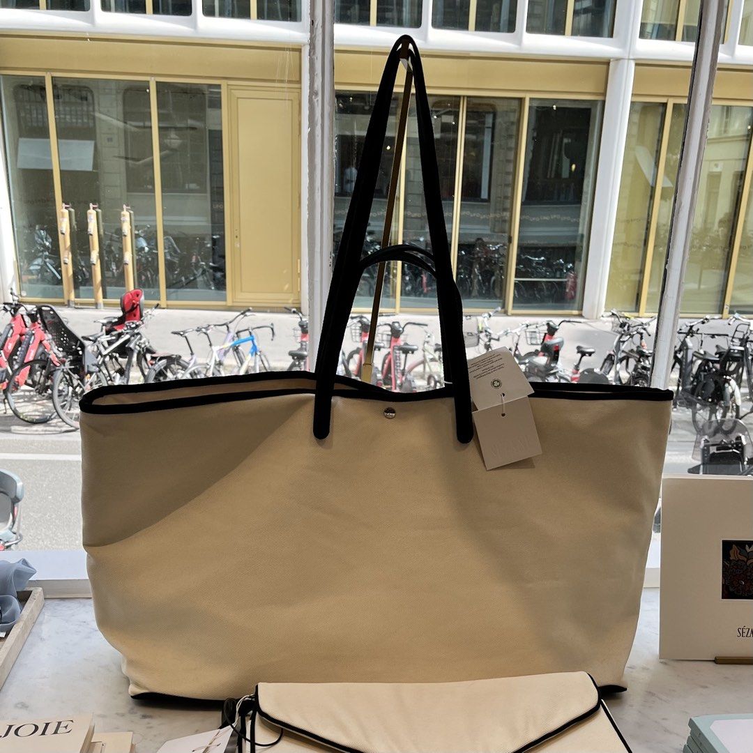 Sezane Paule Weekender Tote Bag (Category: Tote Bags) located in Quezon City. Submitted by nchm88 (Listing ID 1460361730, Image 3). Description: Paris pasabuy! Paule weekender tote - Top handle or shoulder carry - Interior: one zipped pocket and three patch pockets - Silver snap button closure - Main material: GOTS certified cotton - Lining: GOTS certified cotton - Dimensions: 21.7 x 13.8 x 8.7 in / 55 x 35 x 22 cm *For Preorder Item will arrive 