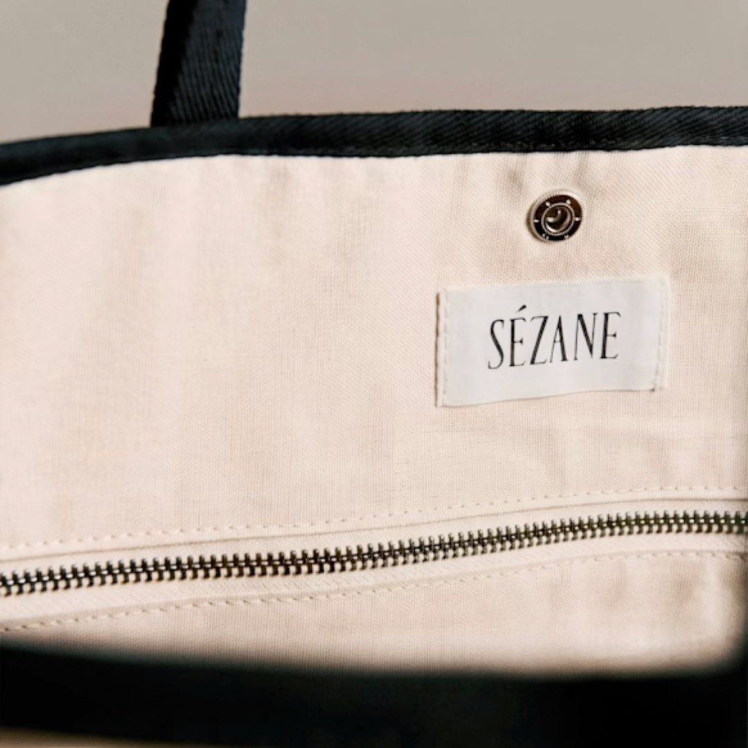 Sezane Paule Weekender Tote Bag (Category: Tote Bags) located in Quezon City. Submitted by nchm88 (Listing ID 1460361730, Image 2). Description: Paris pasabuy! Paule weekender tote - Top handle or shoulder carry - Interior: one zipped pocket and three patch pockets - Silver snap button closure - Main material: GOTS certified cotton - Lining: GOTS certified cotton - Dimensions: 21.7 x 13.8 x 8.7 in / 55 x 35 x 22 cm *For Preorder Item will arrive 