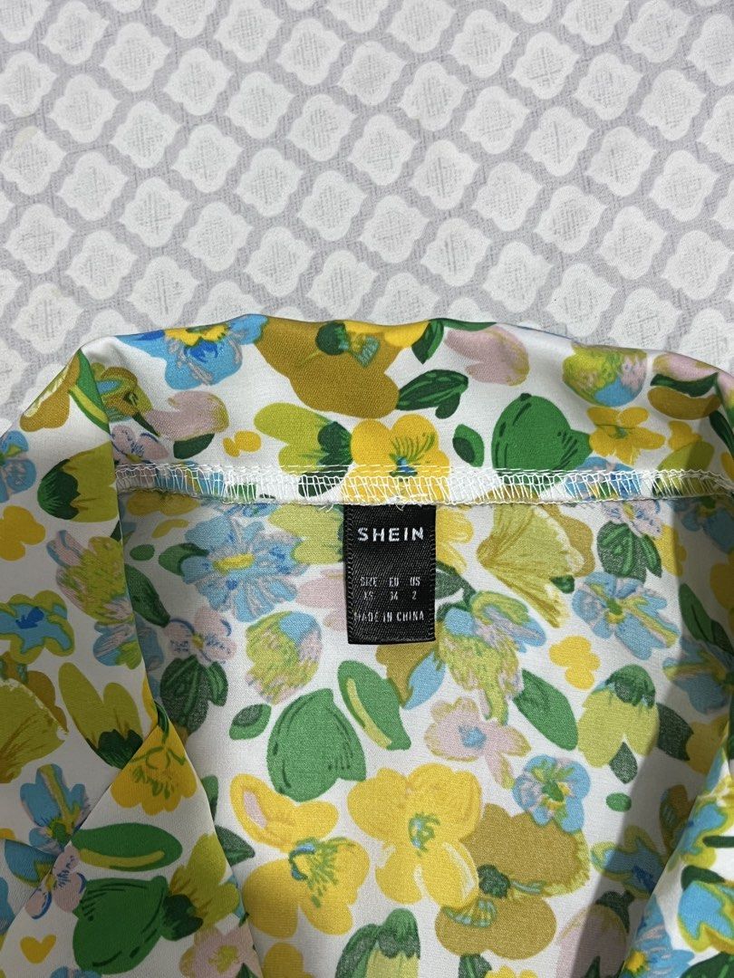 SH3IN Floral Button Down Top (Category: Blouses) located in Marikina City. Submitted by trish.grcia (Listing ID 1460381913, Image 3). Description: • Floral print • Button-down style • Cute & versatile • Good condition • Small but can fit to Medium.
