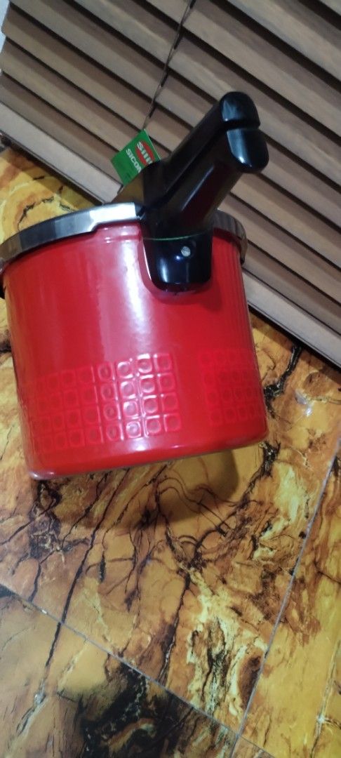 Sharp 7L Pressure Cooker (Category: Cookers) located in Caloocan City. Submitted by rowely_jpn (Listing ID 1460440750, Image 1). Description: Silit brand pressure cooker, 7L capacity. Red exterior with a textured pattern. Stainless steel lid and handle. Comes with an inner steaming rack. Great for cooking meals quickly. Made of ordinary steel plate with surface treatment enamel..