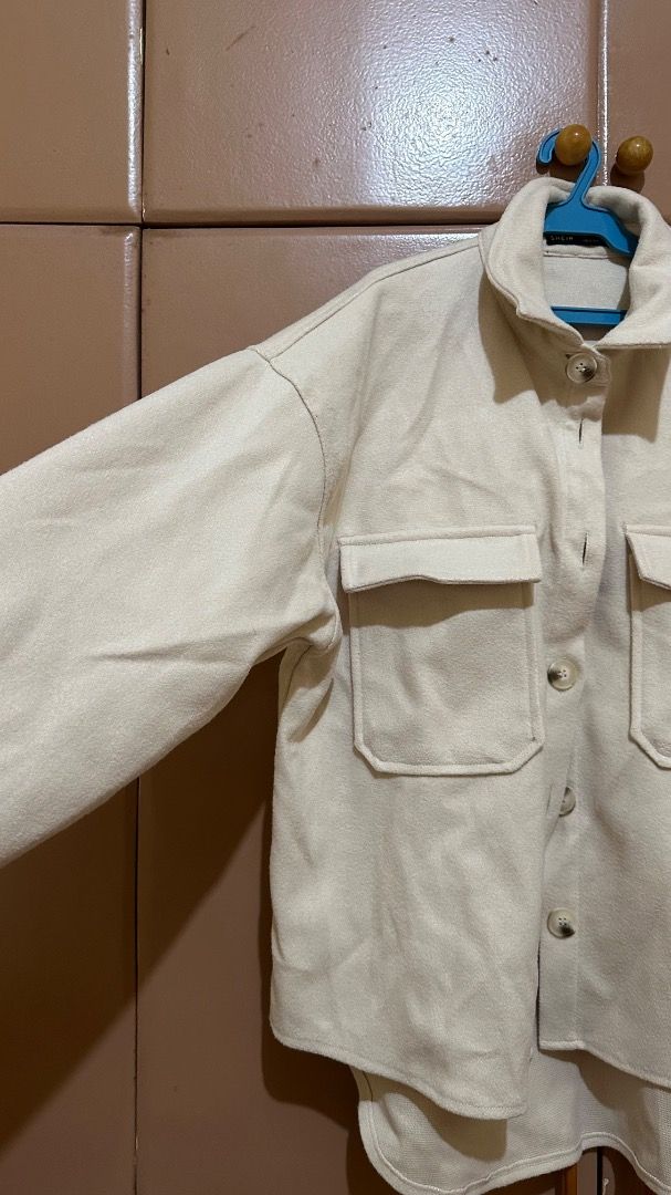 SHEIN Beige Oversized Button-Up Jacket with Pockets (Category: Coats, Jackets and Outerwear) located in Cebu City. Submitted by pasabaicebu (Listing ID 1460373264, Image 3). Description: — Oversized beige jacket — Button-up front — Two chest pockets Brand: SHEIN Size on tag: Small (S) Fits (L) in Women if not oversized Condition: 10/10, never been used & no tag.
