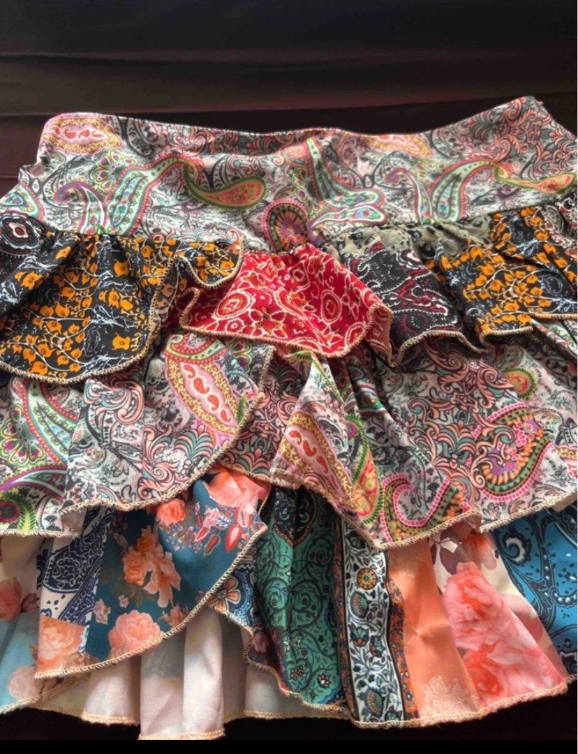 SHEIN Patchwork Paisley Ruffle Mini Skirt XS (Category: Skirts) located in Bacolor. Submitted by mxspicychicken (Listing ID 1460358746, Image 3). Description: - Cute patchwork mini skirt from SHEIN - Features paisley and floral print - Ruffle details for a feminine touch - Comfortable elastic waistband - Size XS - Ideal for a bohemian or fun, casual look - Easy to style with basic tops.