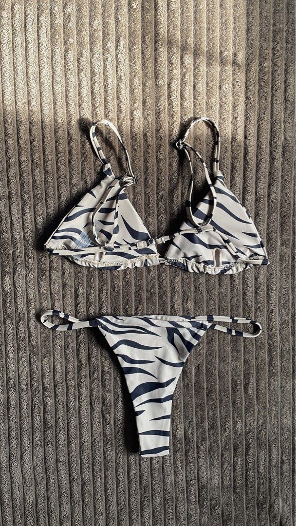 SHEIN Swim Summer Beach Zebra Stripe Bikini Set (Category: Bikinis & Swimsuits) located in Cavite. Submitted by kyrasalvad19608 (Listing ID 1460388150, Image 3). Description: - Trendy zebra print bikini set - Triangle top with adjustable straps - Color: Khaki & Black - Flaws: Used Once.